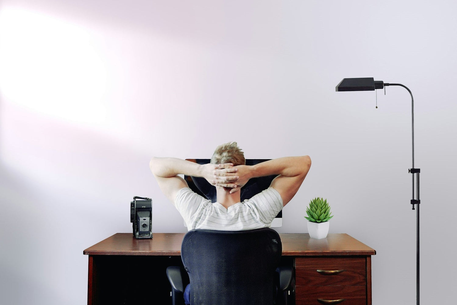 Work From Home? Here's How To Stop Back Pain From Sitting Too Long