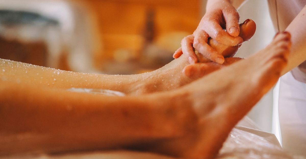 A soothing foot massage session in a tranquil spa, promoting relaxation and wellness.